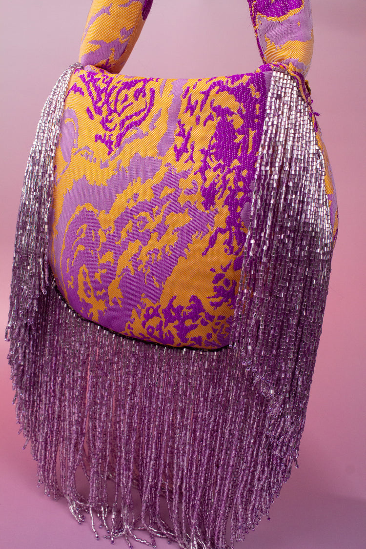 Bolso de hombro Soleil tejido jacquard flecos malva