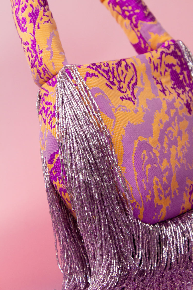 Bolso de hombro Soleil tejido jacquard flecos malva