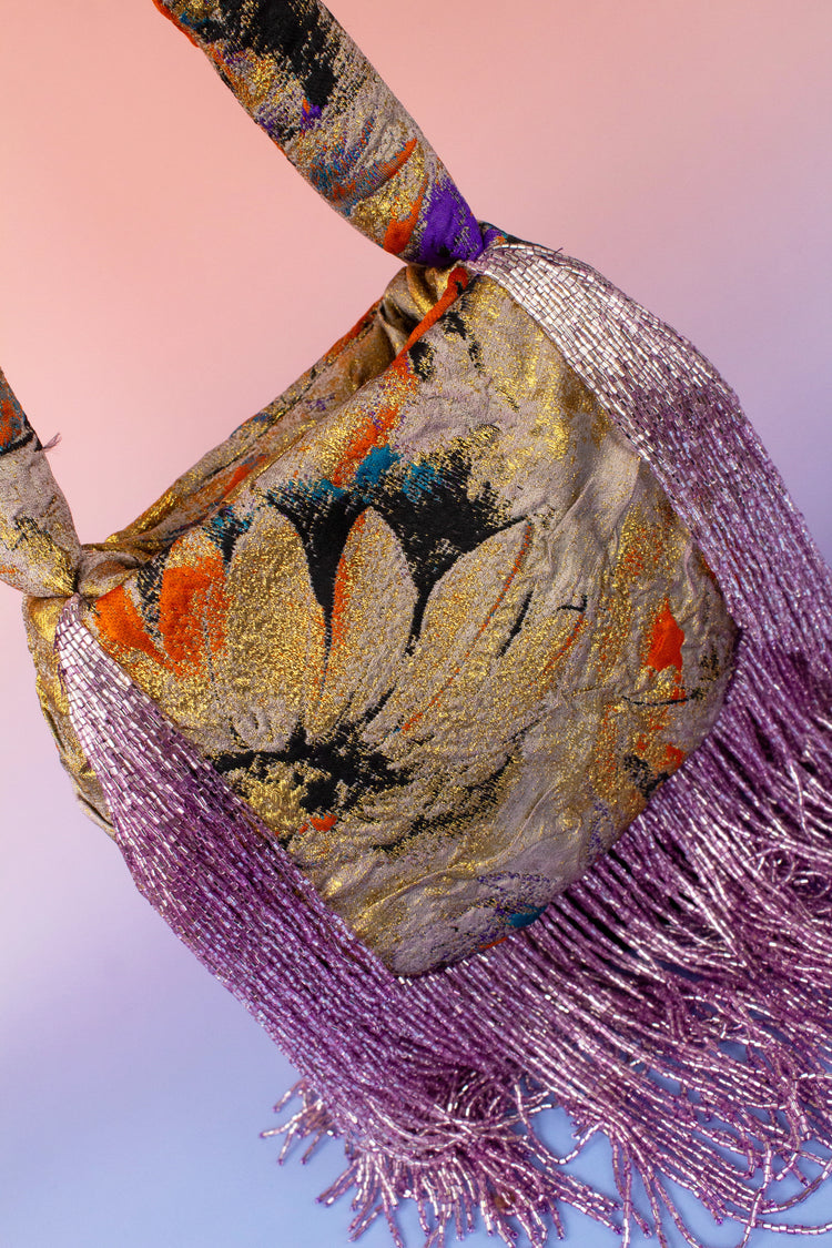Bolso soleil flecos malva