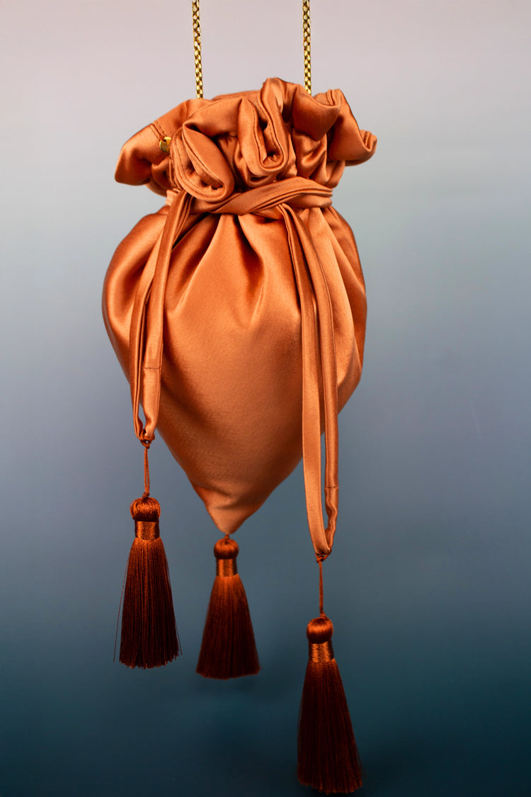 Bolso Limosnera óxido con borlones
