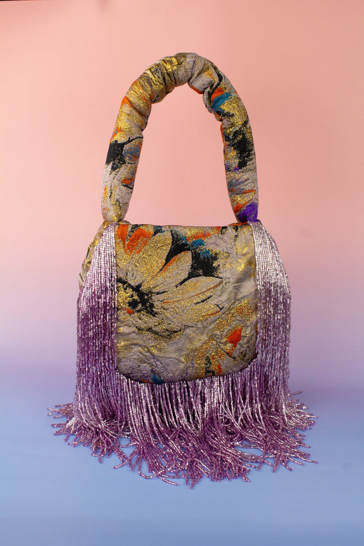 Bolso soleil flecos malva