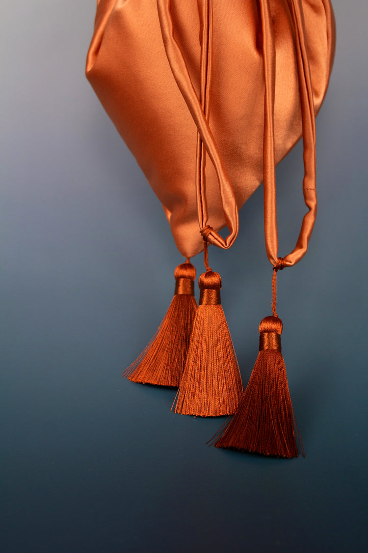 Bolso Limosnera óxido con borlones
