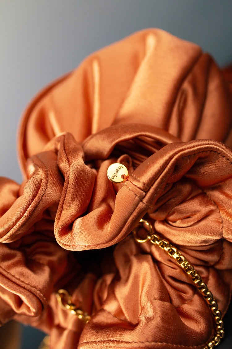 Bolso Limosnera óxido con borlones